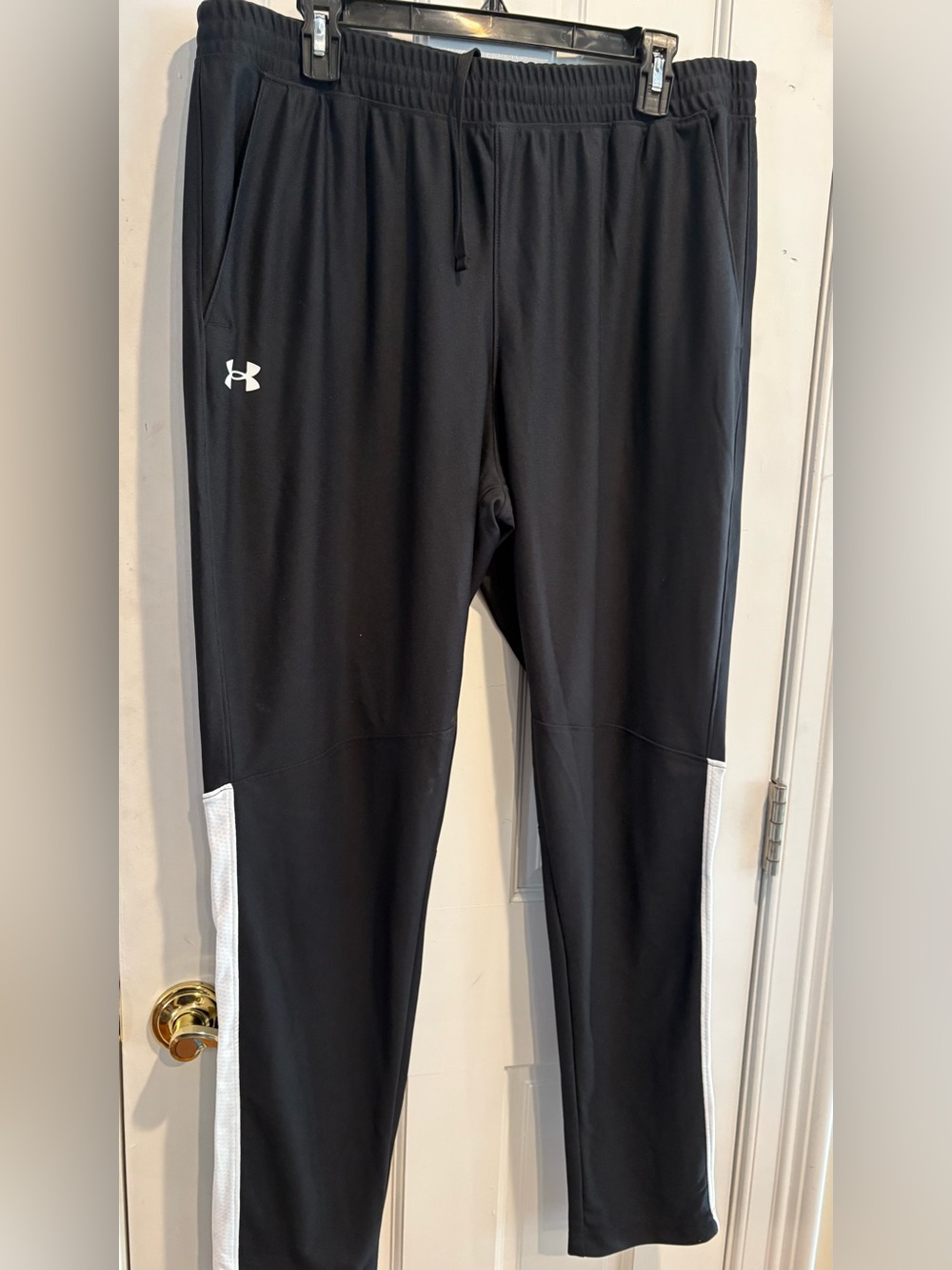 NWT! Men’s Under Armour Black Joggers with White on Botton Side. Size XL